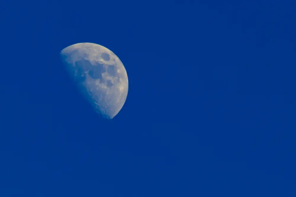 Moon over blue sky